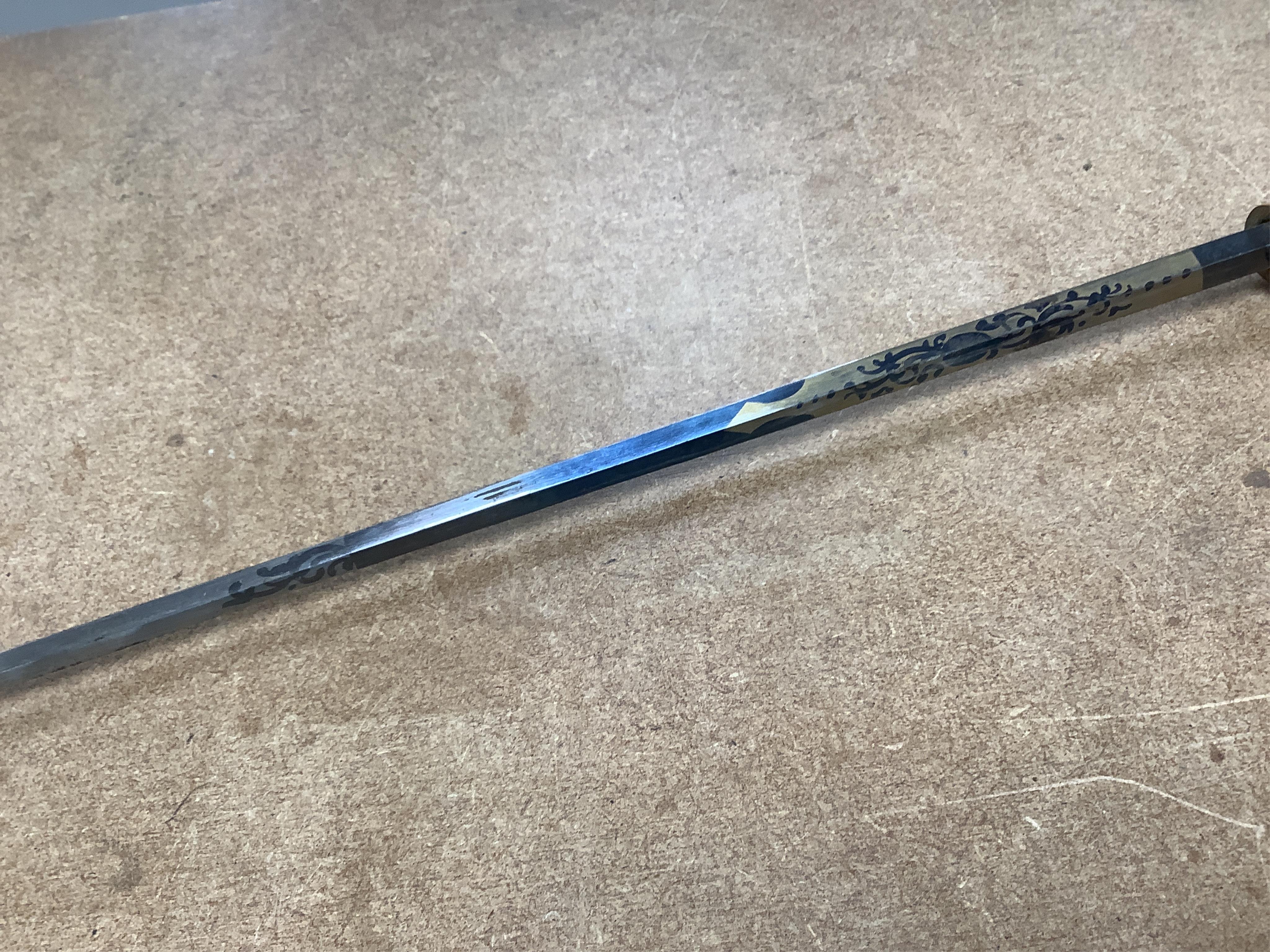 A Victorian silver mounted sword stick, with damascene blade, 90cm in length